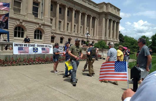 American Veterans receiving Flags